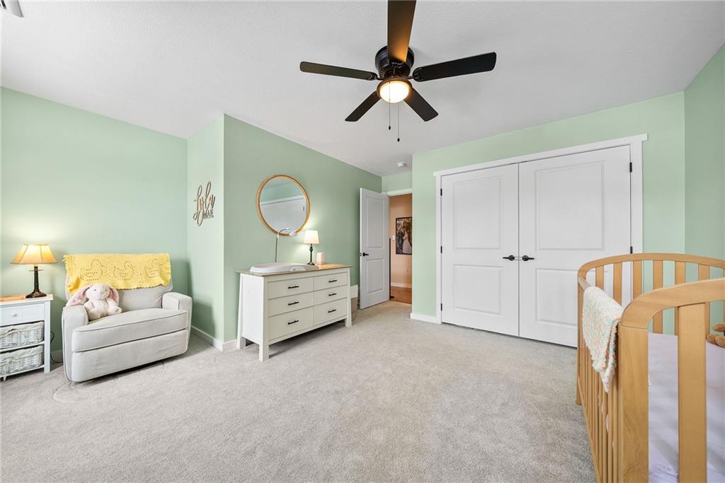 141 Morningstar Drive Rostraver Township, PA 15012 - Photo 30 of 39 Bright third bedroom with natural light that enhances the room’s open feel.