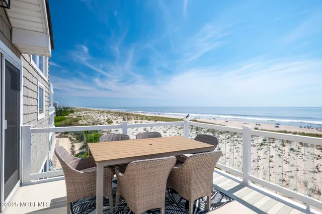 a view of a chairs and table on the terrace