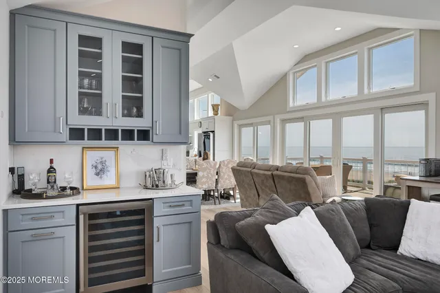 a kitchen with stainless steel appliances kitchen island granite countertop a sink and cabinets