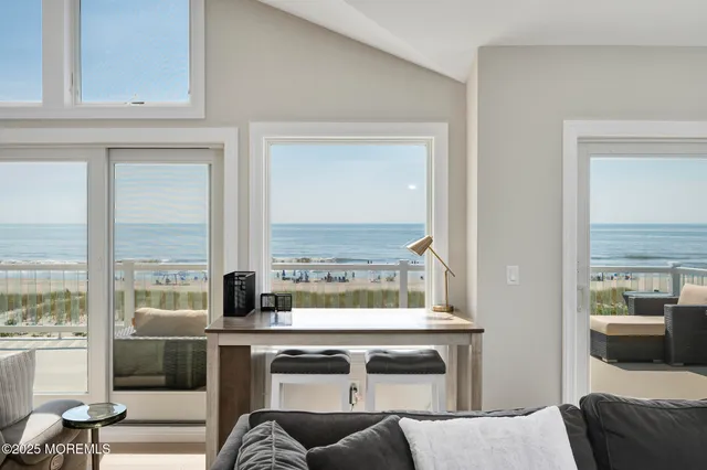 a living room with a couch and a large window