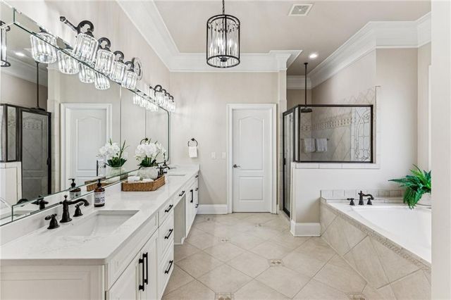 a bathroom with a toilet sink and a mirror