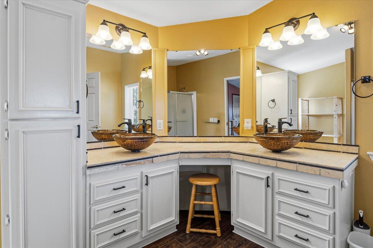 11182 Southwest Dynamite Lane Culver, OR 97734 - Photo 43 of 70 a bathroom with a sink vanity and a mirror