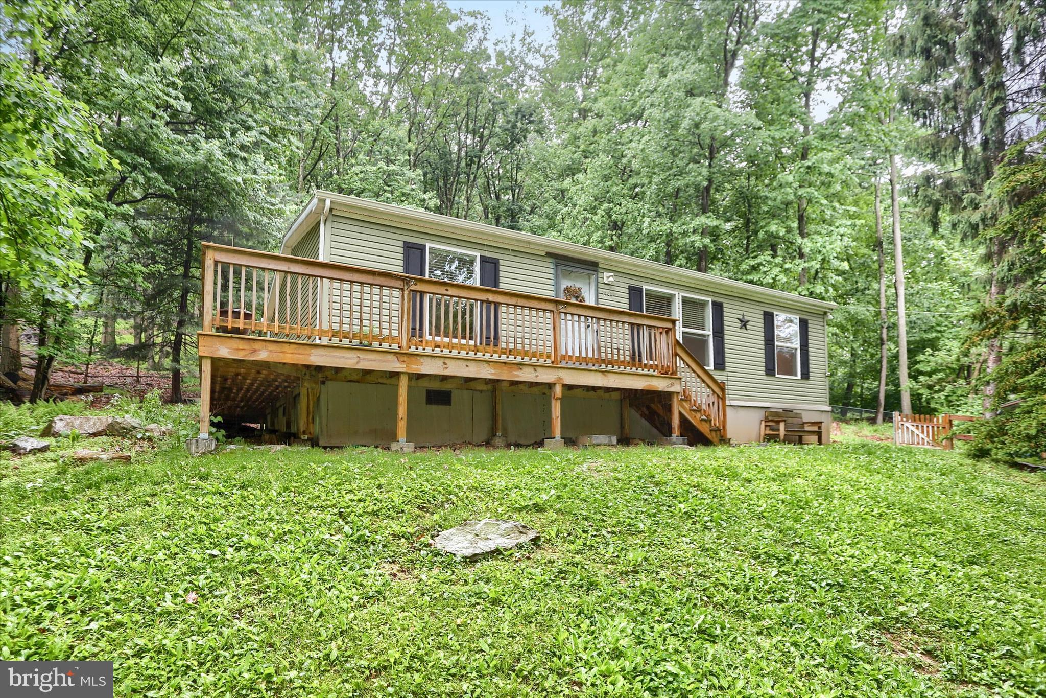 1148 Moulstown Road North Hanover, PA 17331 - Photo 5 of 29 a house with trees in the background