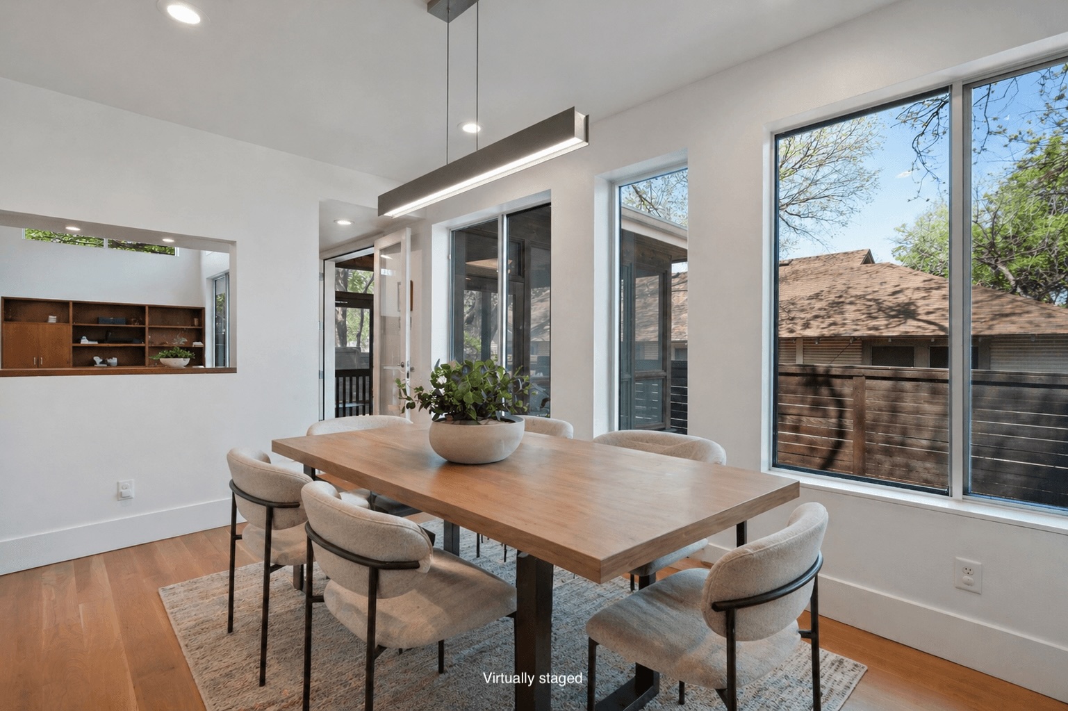 1809 Eva Street Austin, TX 78704 - Photo 14 of 31 a view of a dining room with furniture window and wooden floor