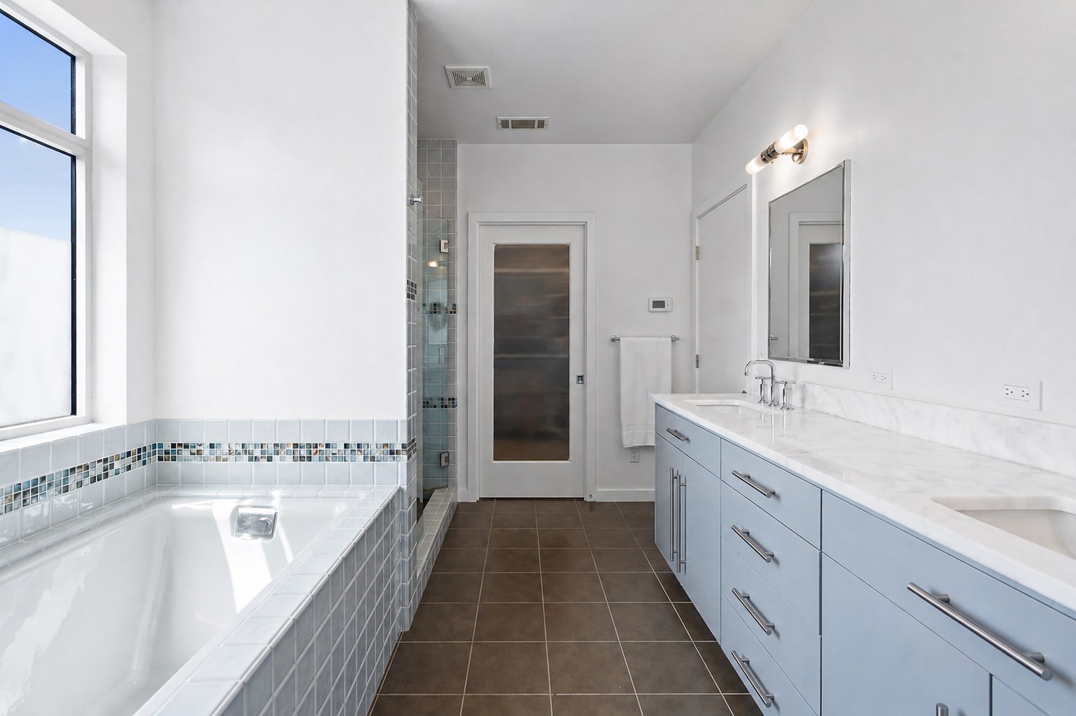 1809 Eva Street Austin, TX 78704 - Photo 20 of 31 a en suite bathroom with a granite countertop sink and a bathtub