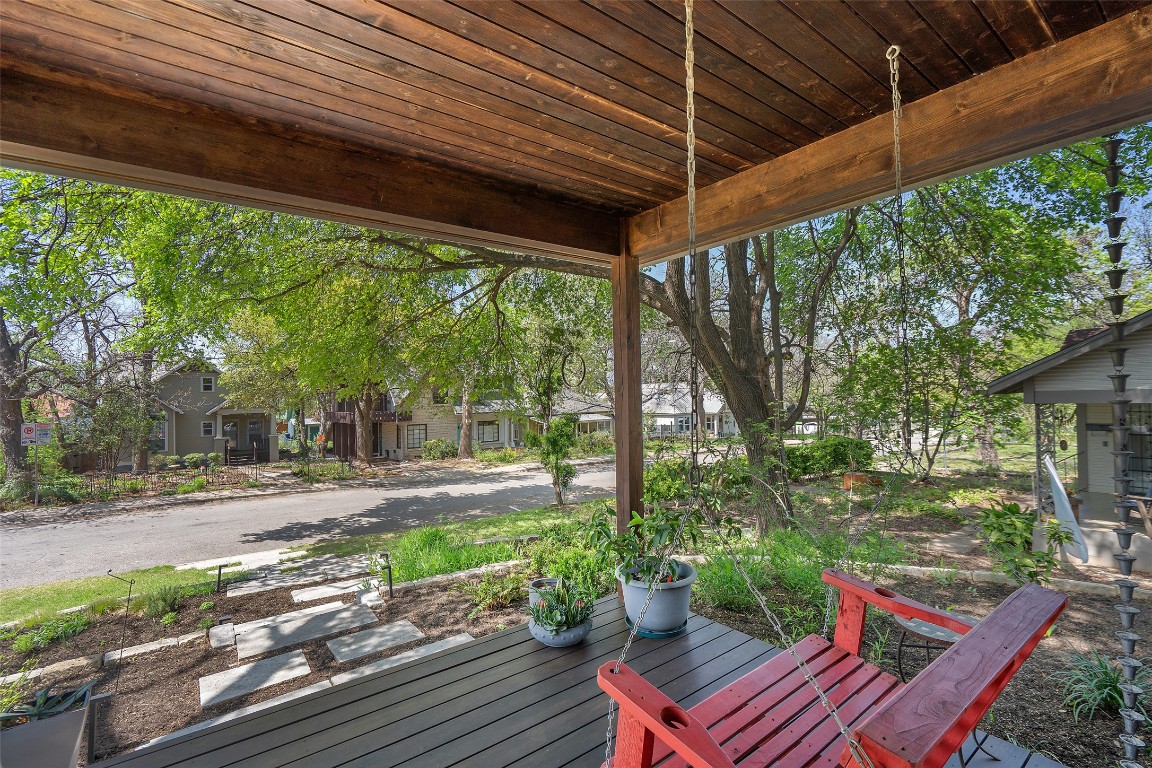 1809 Eva Street Austin, TX 78704 - Photo 2 of 27 a backyard of a house with a garden and outdoor seating