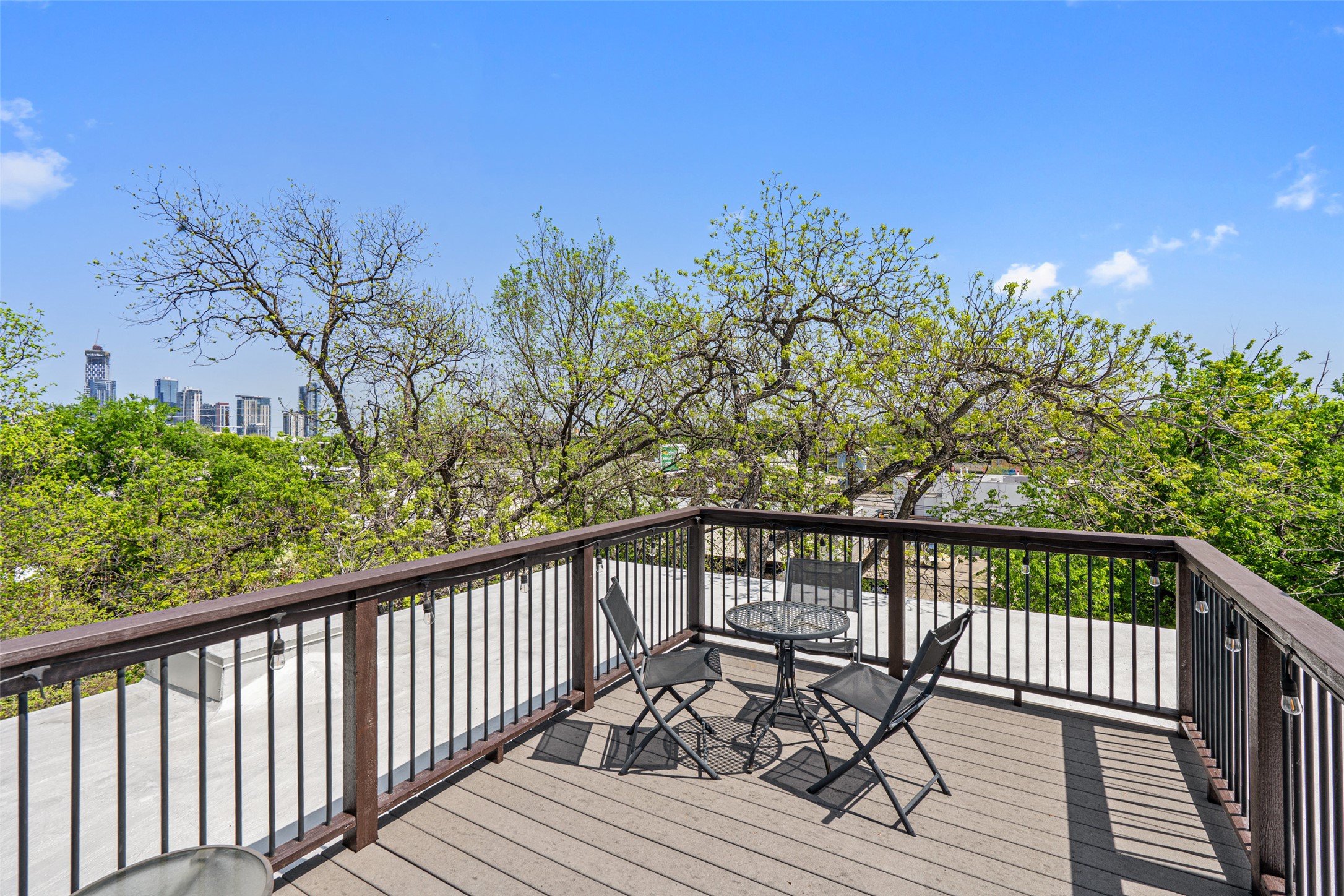 1809 Eva Street Austin, TX 78704 - Photo 25 of 31 a view of a balcony with wooden floor and fence