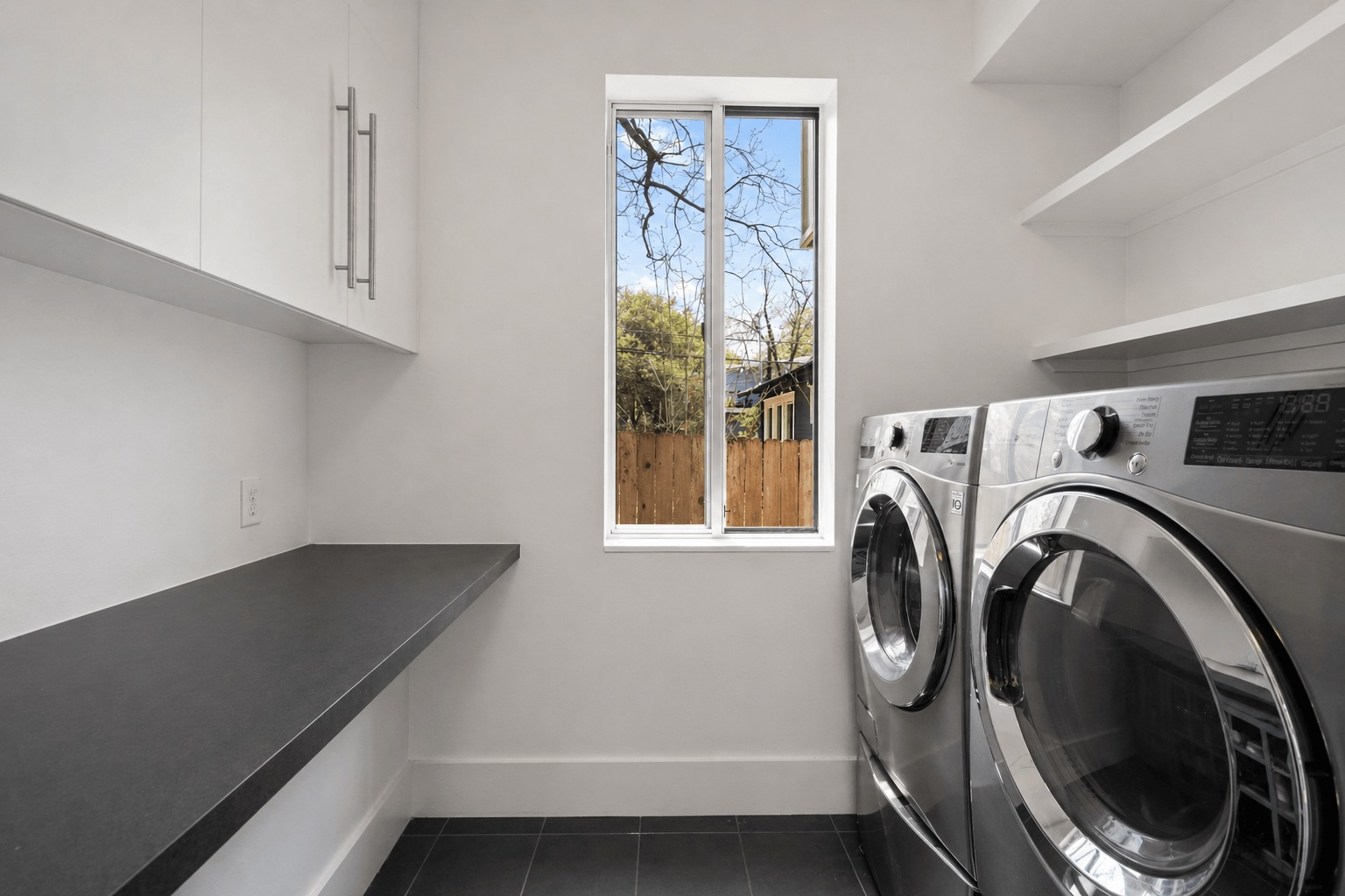 1809 Eva Street Austin, TX 78704 - Photo 27 of 31 a utility room with dryer and washer