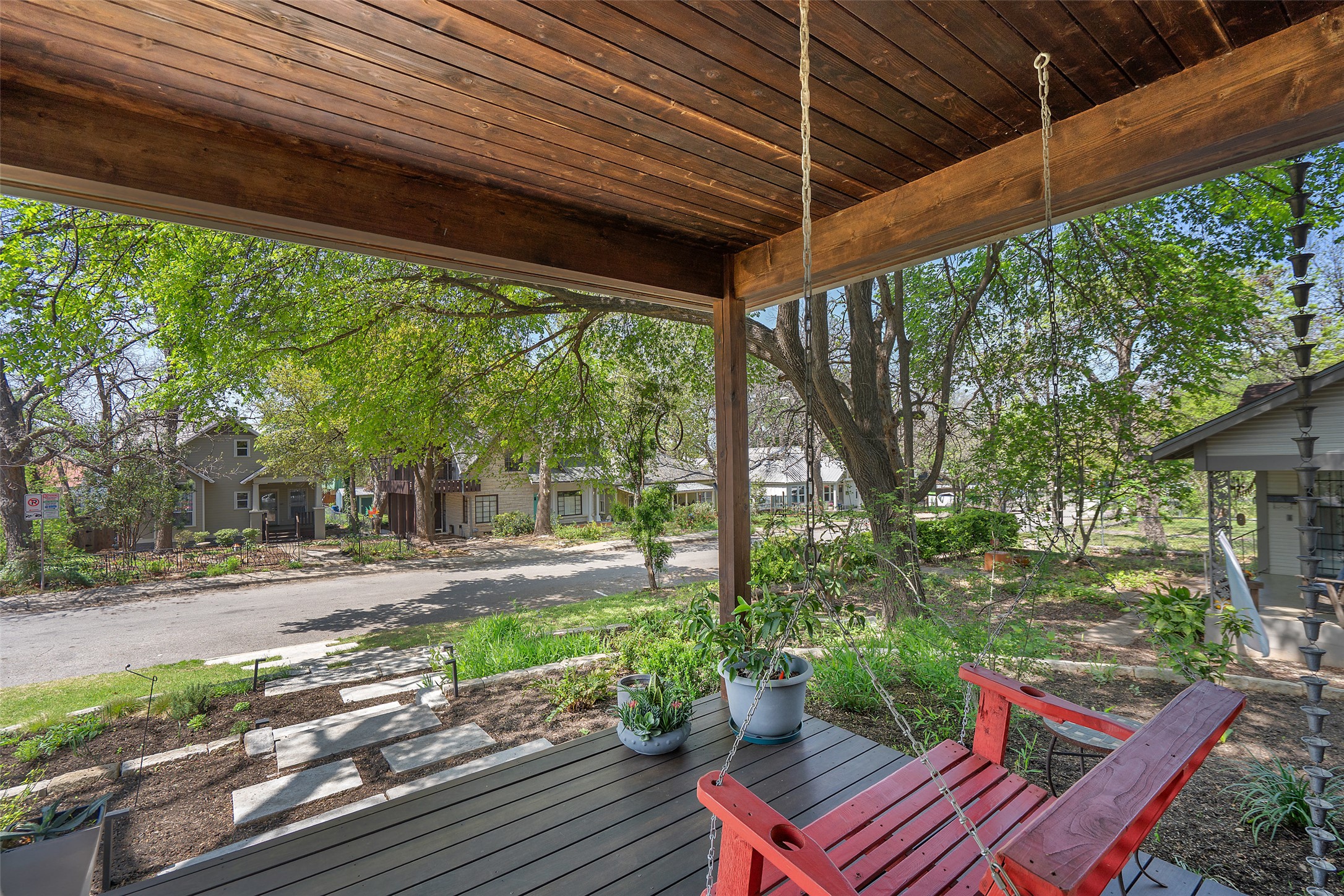 1809 Eva Street Austin, TX 78704 - Photo 3 of 31 a backyard of a house with a garden and outdoor seating