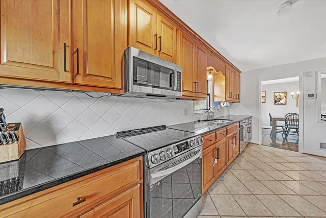 a view of workspace with wooden floor windows