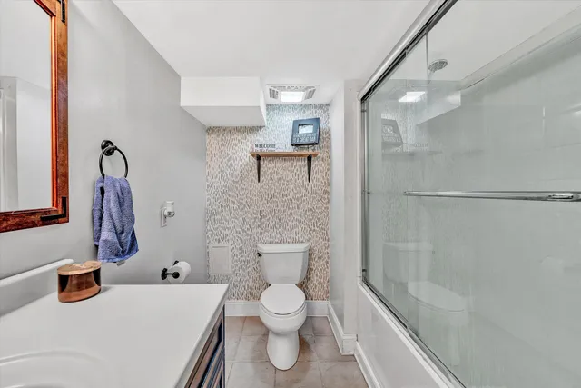 a view of a balcony with chairs