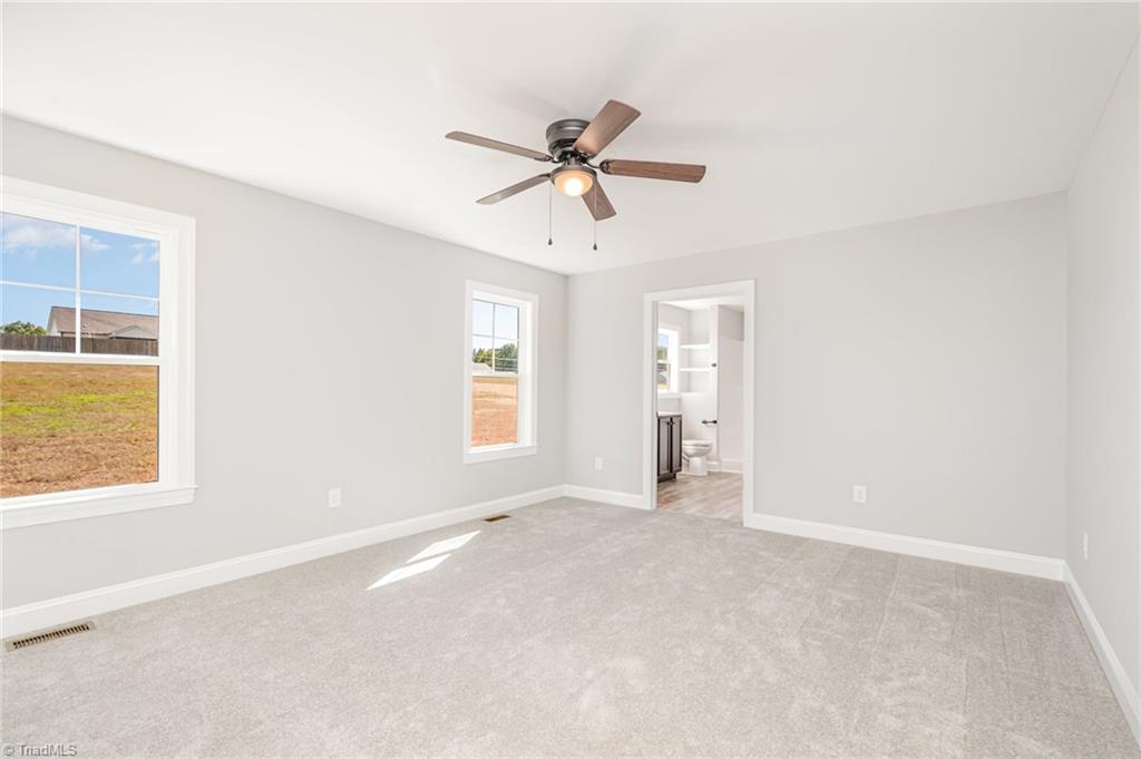 139 Knight Farm Road Stokesdale, NC 27357 - Photo 12 of 26 Primary Bedroom