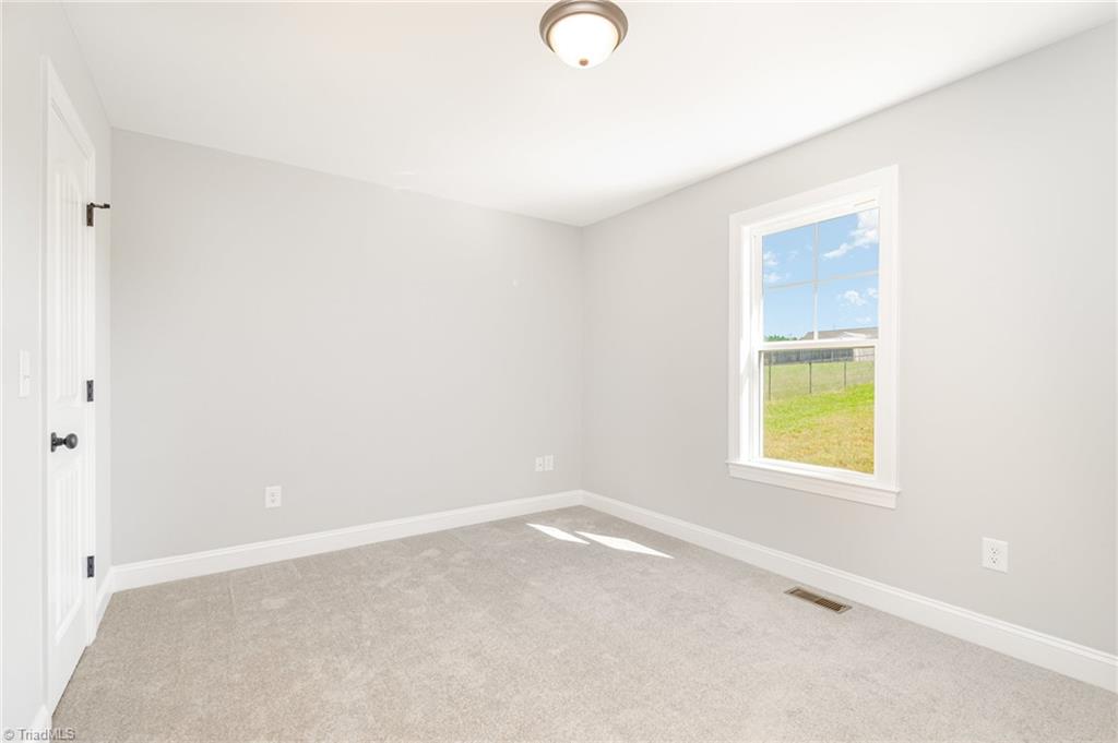 139 Knight Farm Road Stokesdale, NC 27357 - Photo 16 of 26 2nd Bedroom