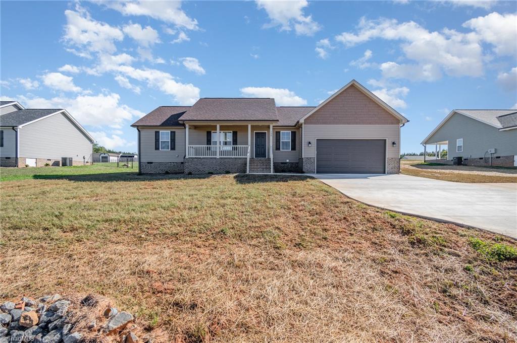 139 Knight Farm Road Stokesdale, NC 27357 - Photo 2 of 26 Front View from Road