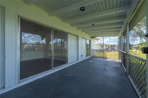 a view of porch with green space