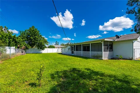 a view of a house with a garden