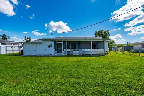 a view of a house with a garden