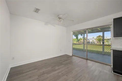 a view of entryway with wooden floor