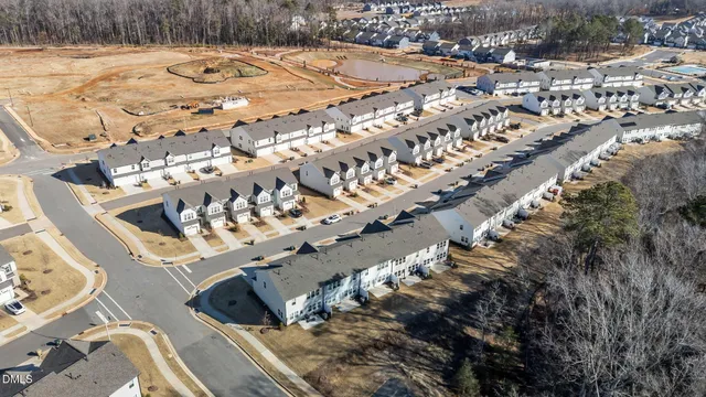 a view of a swimming pool and a yard
