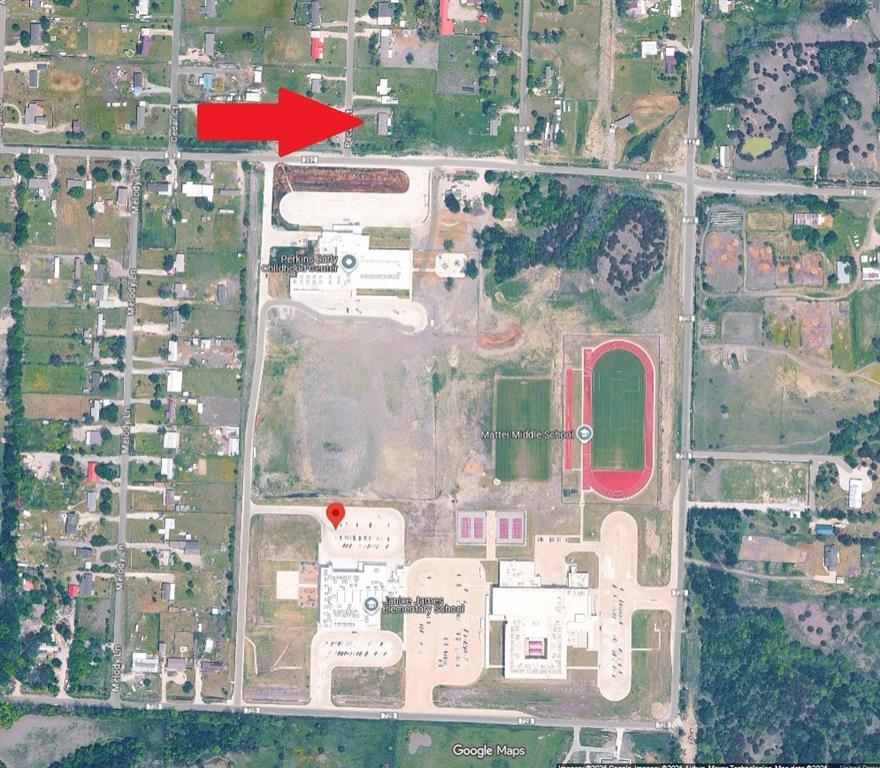 3077 Pecan Court Princeton, TX 75407 - Photo 1 of 37 a aerial view of multi story residential apartment building with yard