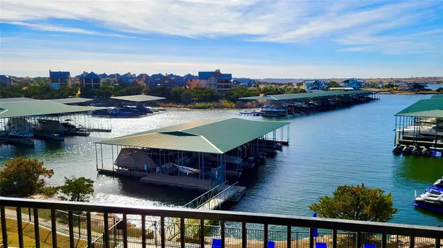 a view of swimming pool from a balcony
