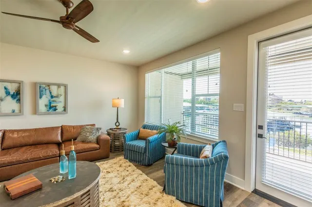 a bed room with a bed and a large window