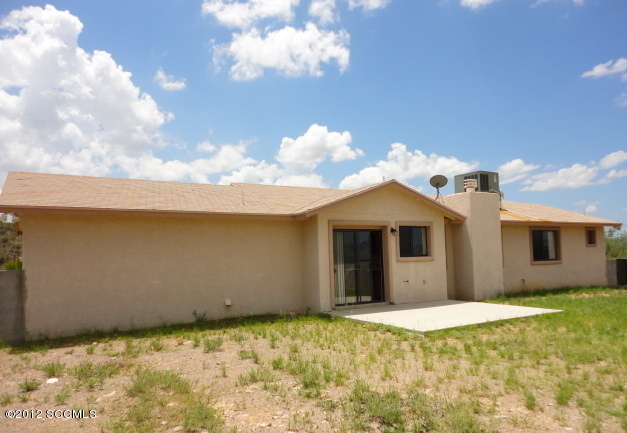 306 Camino La Pasida Rio Rico, AZ 85648 - Photo 9 of 10 a view of a house with a yard