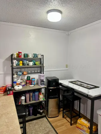 a room with furniture and a shelf