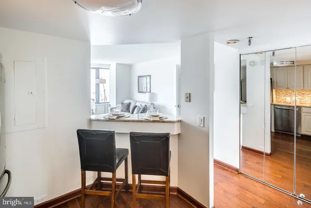 a bathroom with a sink a mirror and a shower