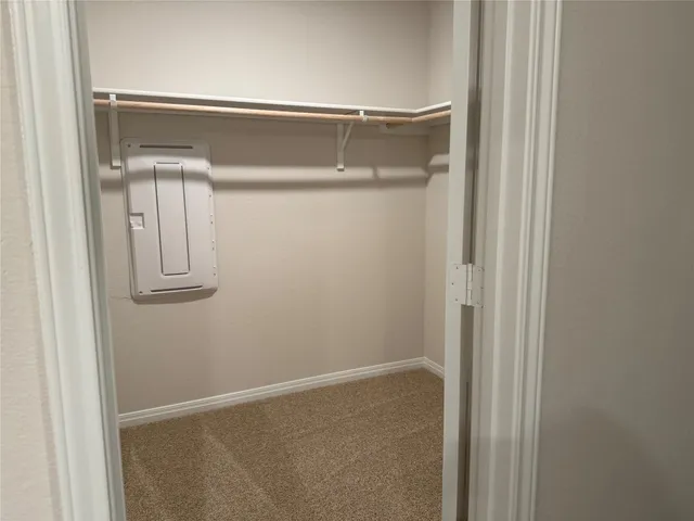 an empty room with cabinet