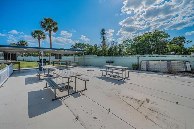 a view of a terrace with sitting area