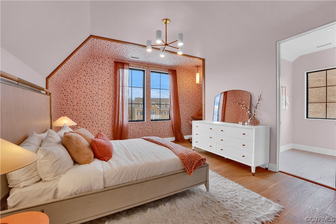 3501 Ormiston Grove Circle Henrico, VA 23233 - Photo 12 of 48 a bedroom with a large bed and wooden floor