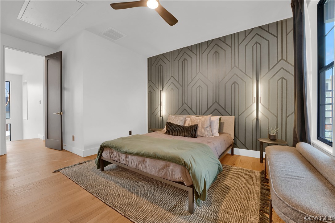 3501 Ormiston Grove Circle Henrico, VA 23233 - Photo 16 of 48 a bedroom with a bed lamp and a fireplace