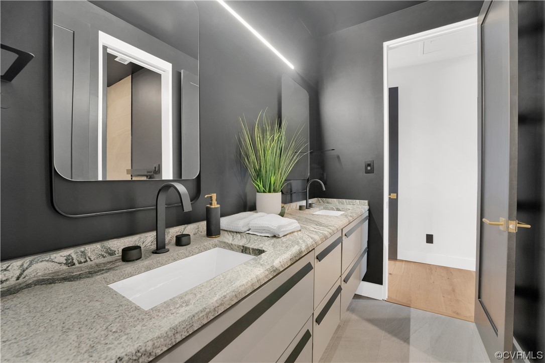 3501 Ormiston Grove Circle Henrico, VA 23233 - Photo 18 of 48 a bathroom with a granite countertop sink and a mirror