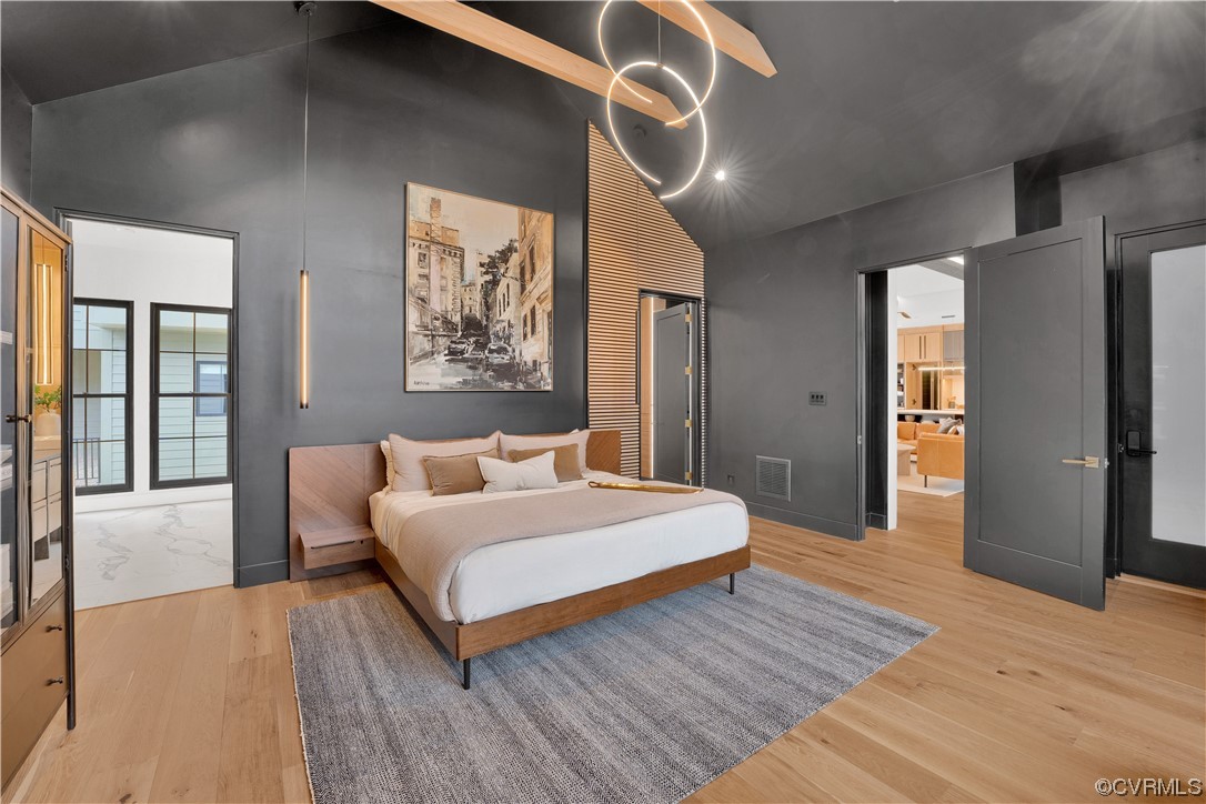 3501 Ormiston Grove Circle Henrico, VA 23233 - Photo 4 of 48 a bedroom with a large bed and wooden floor