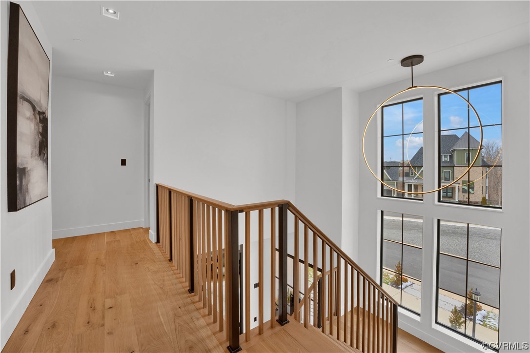 3501 Ormiston Grove Circle Henrico, VA 23233 - Photo 8 of 48 a view of staircase with wooden floor and fan