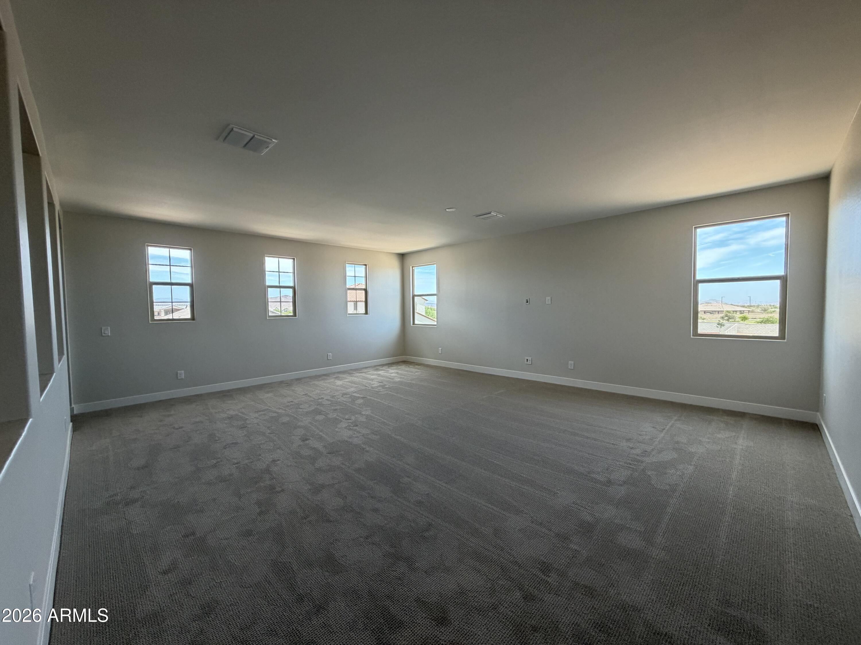 15767 West Sand Hills Road Surprise, AZ 85387 - Photo 10 of 60 a view of empty room with window
