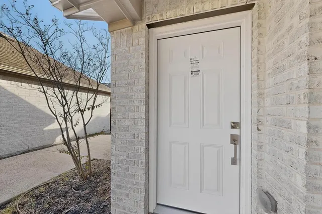 a kitchen that has a sink and a stove in it