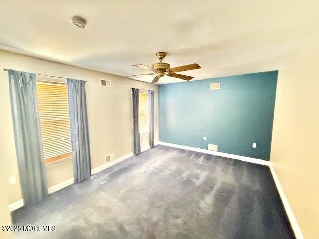 2138 Whitesville Road Toms River, NJ 08755 - Photo 11 of 19 a view of a livingroom with a ceiling fan and window