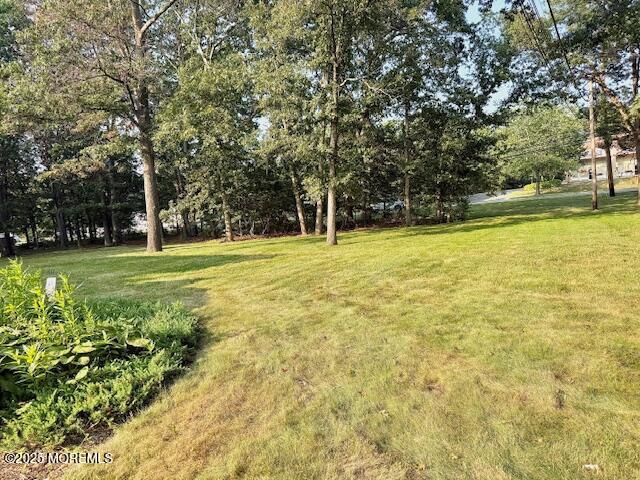 2138 Whitesville Road Toms River, NJ 08755 - Photo 16 of 19 a view of a swimming pool with an outdoor space and seating area