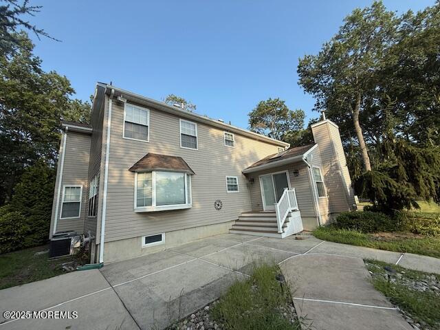 2138 Whitesville Road Toms River, NJ 08755 - Photo 19 of 19 a front view of a house with a garden