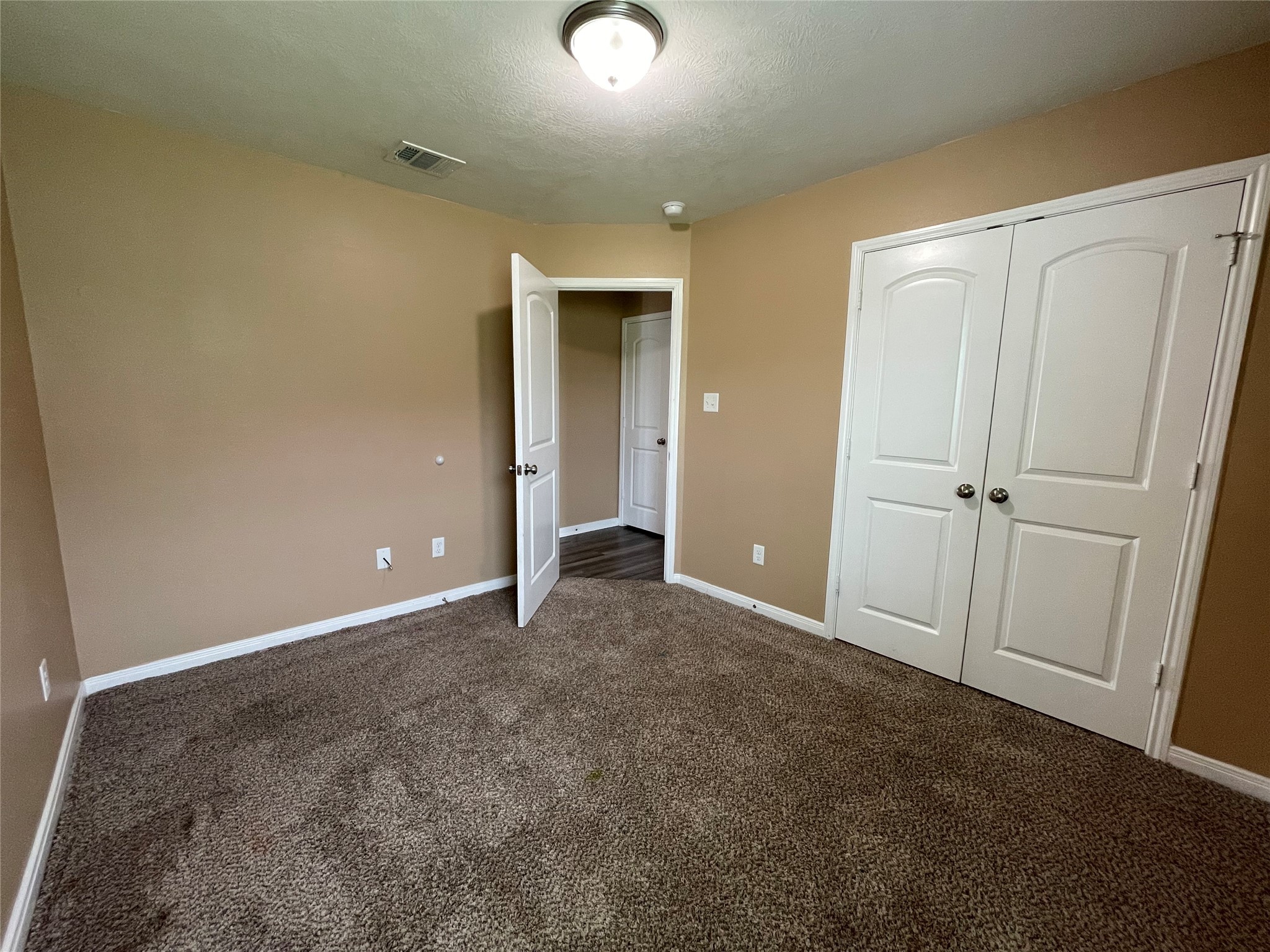 832 Mockingbird Street Navasota, TX 77868 - Photo 17 of 20 an empty room with closet area
