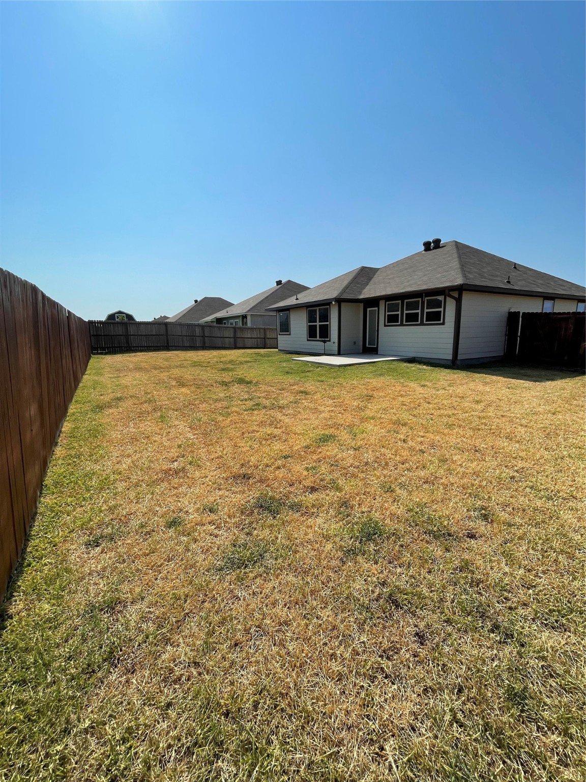 832 Mockingbird Street Navasota, TX 77868 - Photo 18 of 20 a front view of a house with a yard