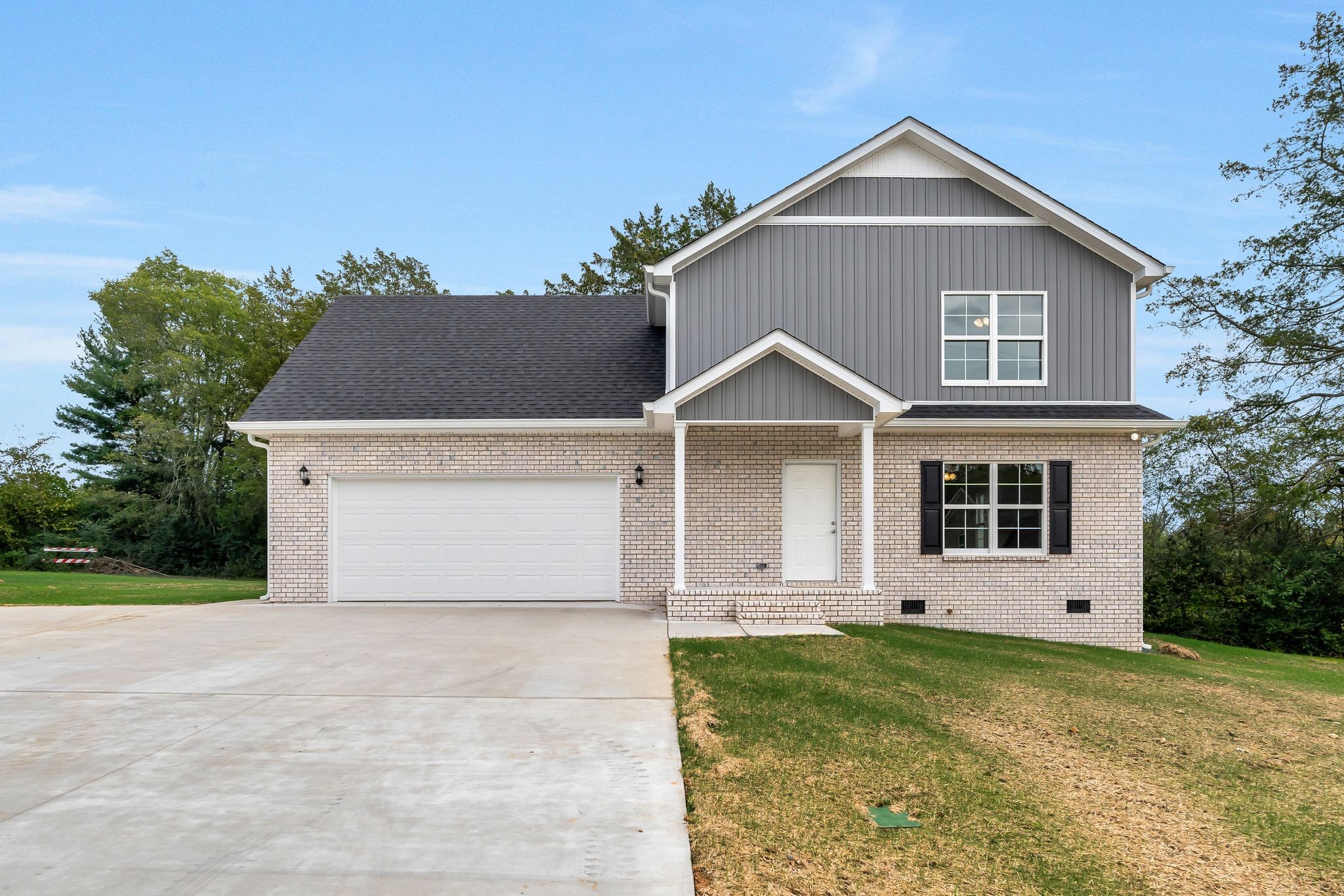 401 Doak Road, Unit 41 Manchester, TN 37355 - Photo 1 of 29 a front view of a house with garden