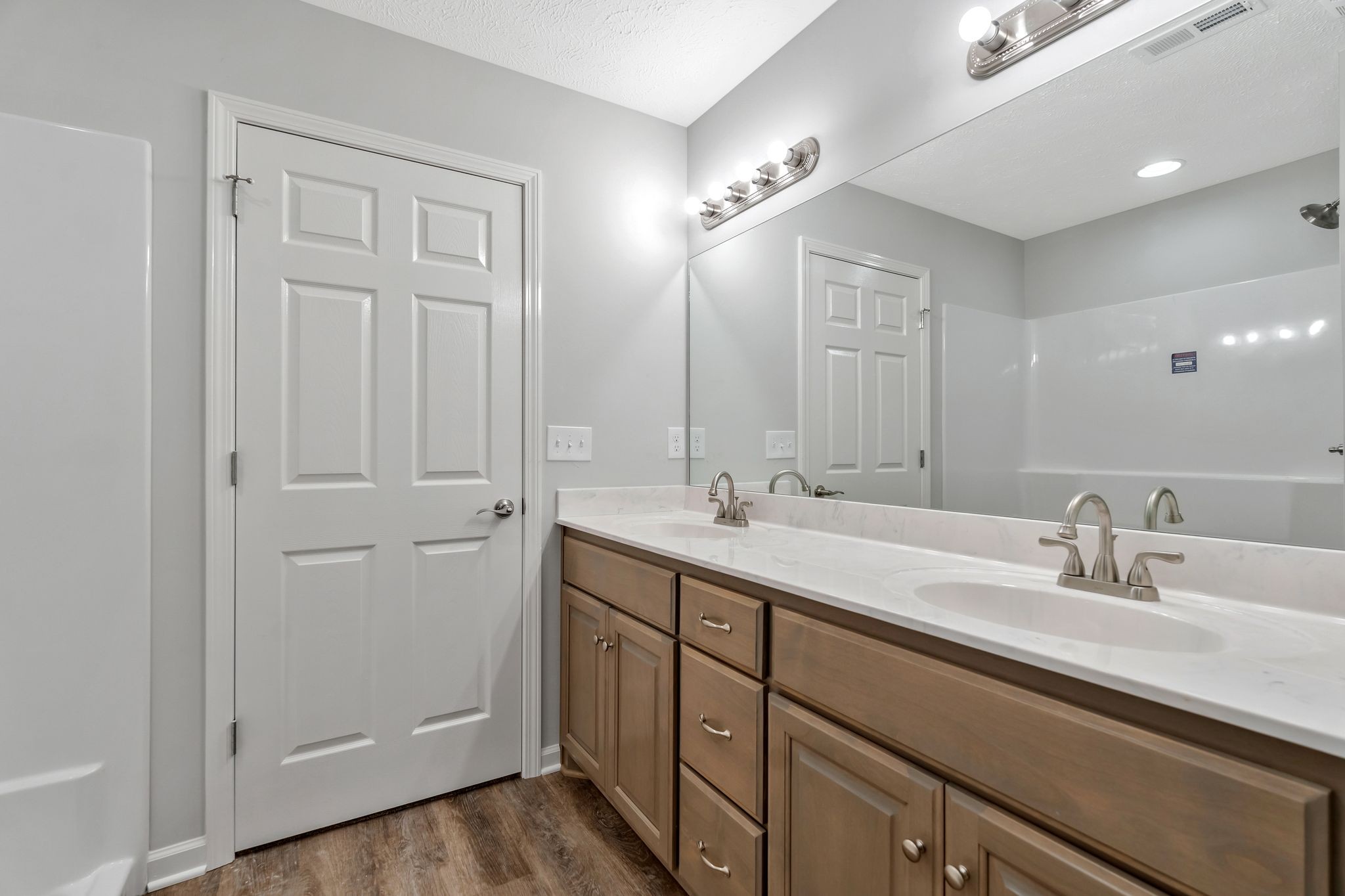 401 Doak Road, Unit 41 Manchester, TN 37355 - Photo 18 of 29 a bathroom with double vanity sinks and a mirror