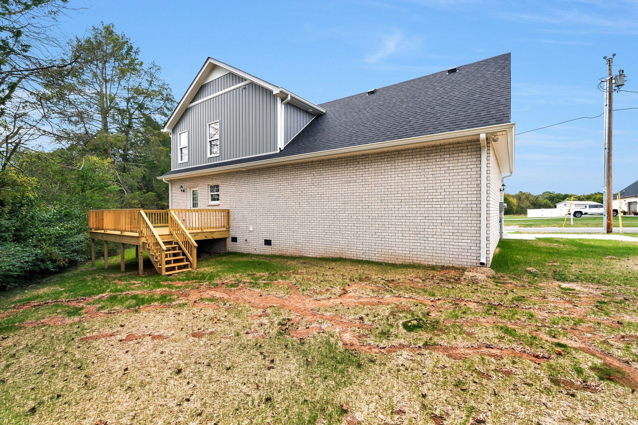 401 Doak Road, Unit 41 Manchester, TN 37355 - Photo 28 of 29 a backyard of a house with table and chairs
