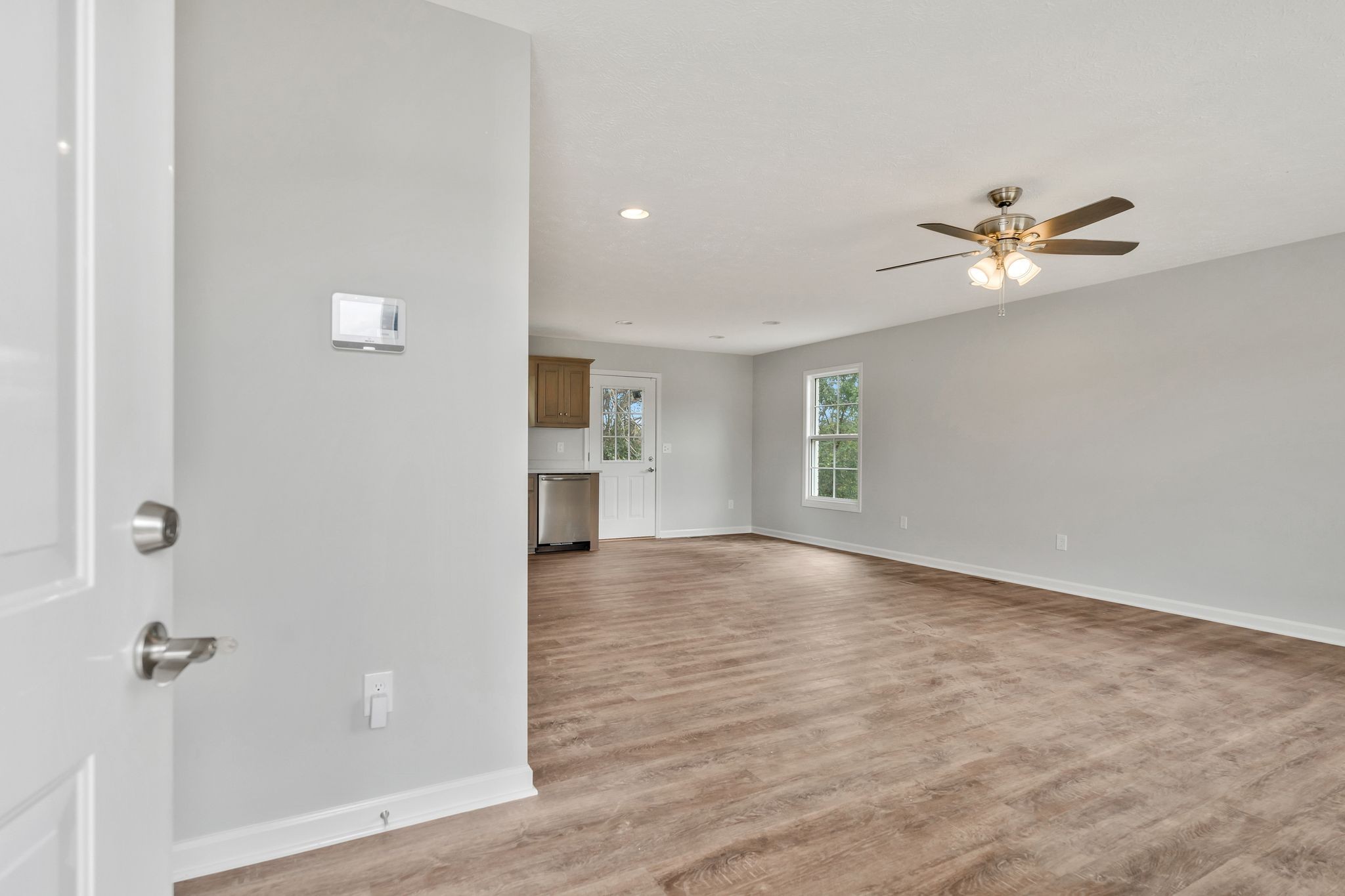 401 Doak Road, Unit 41 Manchester, TN 37355 - Photo 5 of 29 wooden floor in an empty room with a window