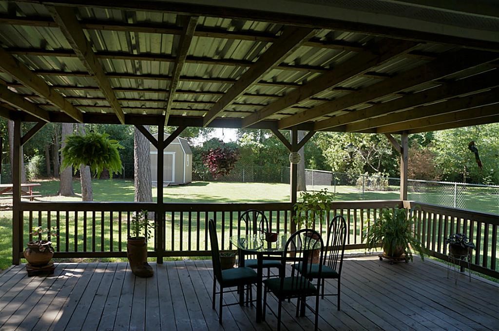 215 Bridgeview Drive Onalaska, TX 77360 - Photo 20 of 29 a view of porch with seating area