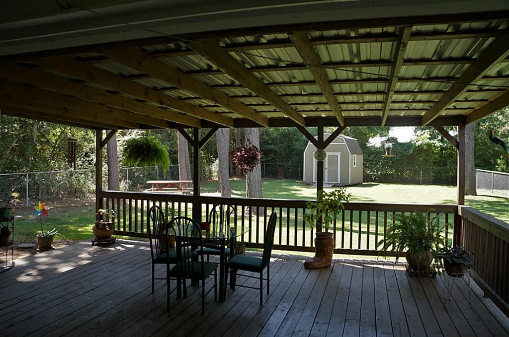 215 Bridgeview Drive Onalaska, TX 77360 - Photo 21 of 29 a view of porch with seating space