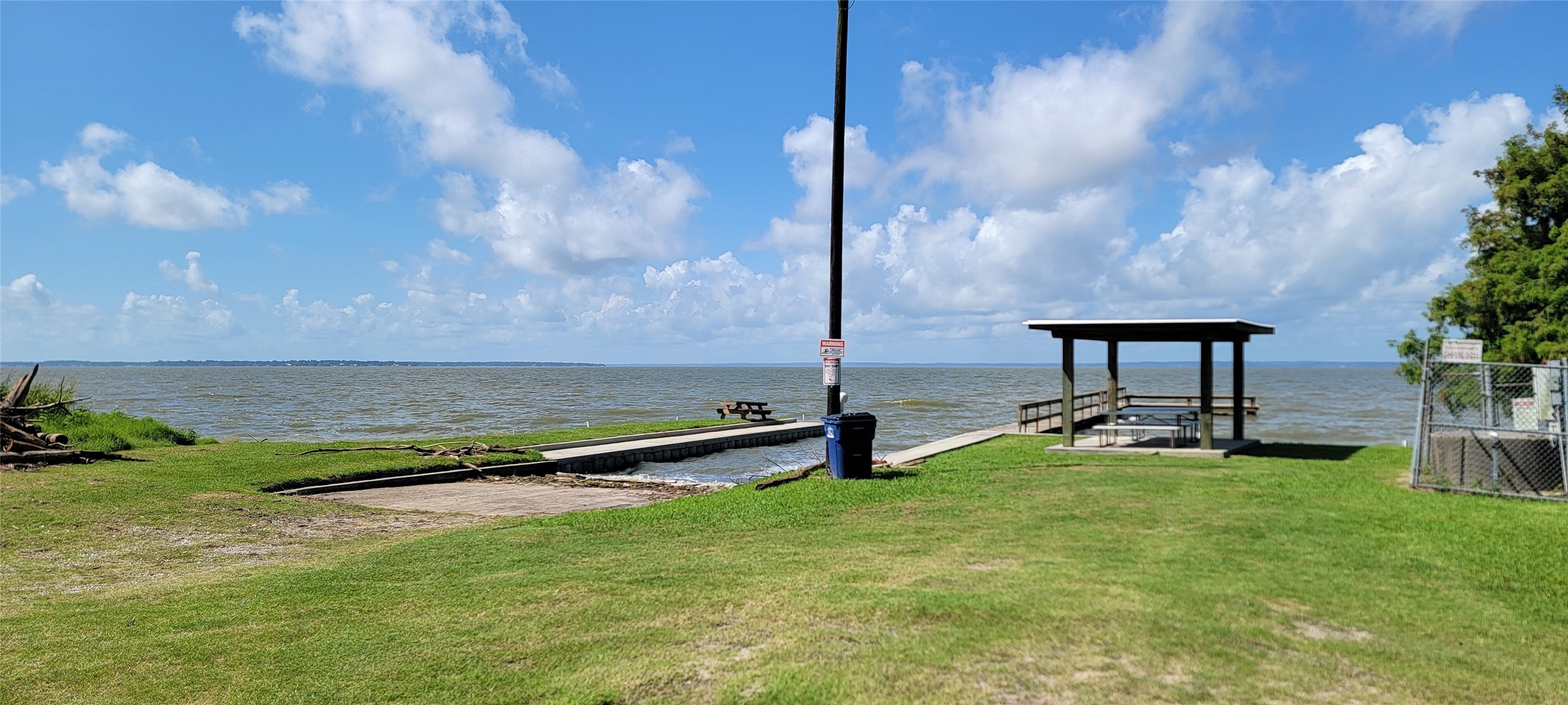 215 Bridgeview Drive Onalaska, TX 77360 - Photo 29 of 29 a view of a terrace with yard